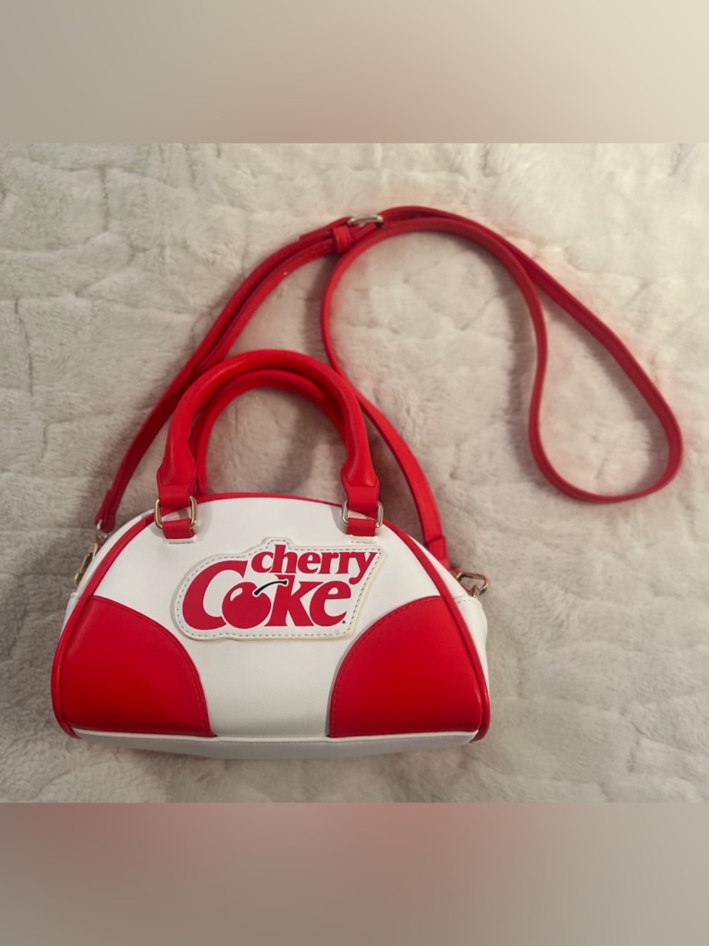 Cherry Coke Bowler Crossbody from Skinnydip London limited-edition .
